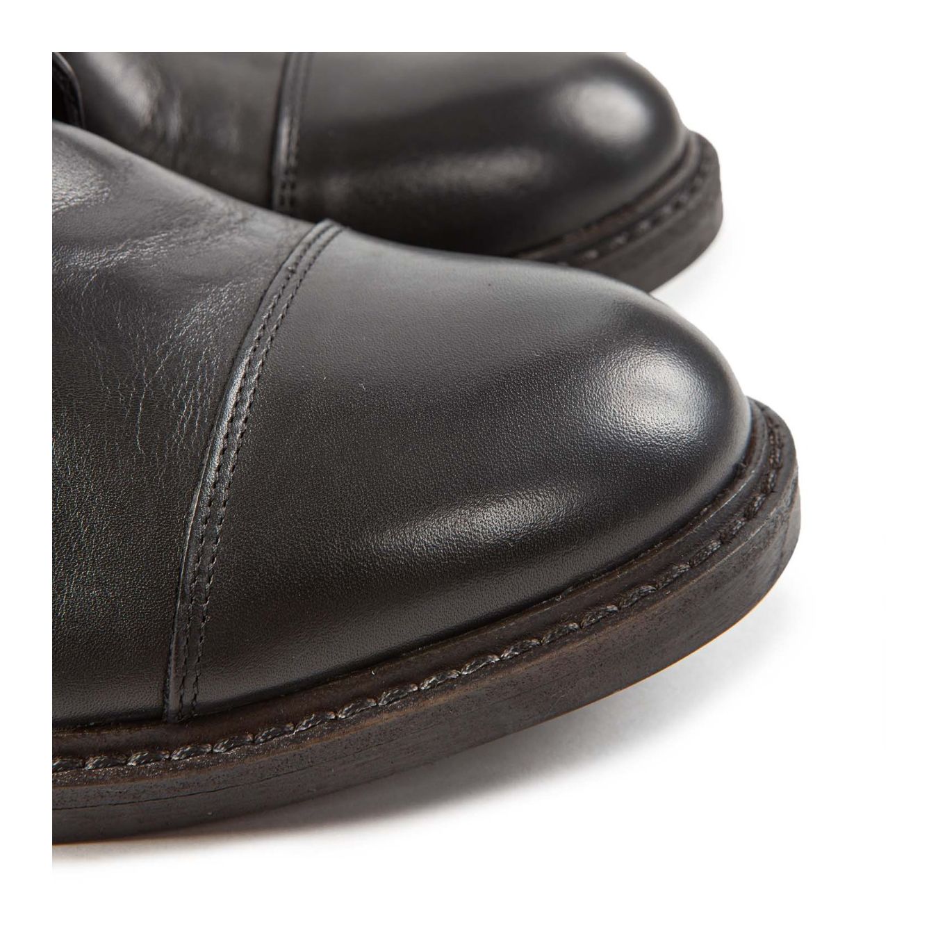 biker occhielli metallo in pelle nera punta