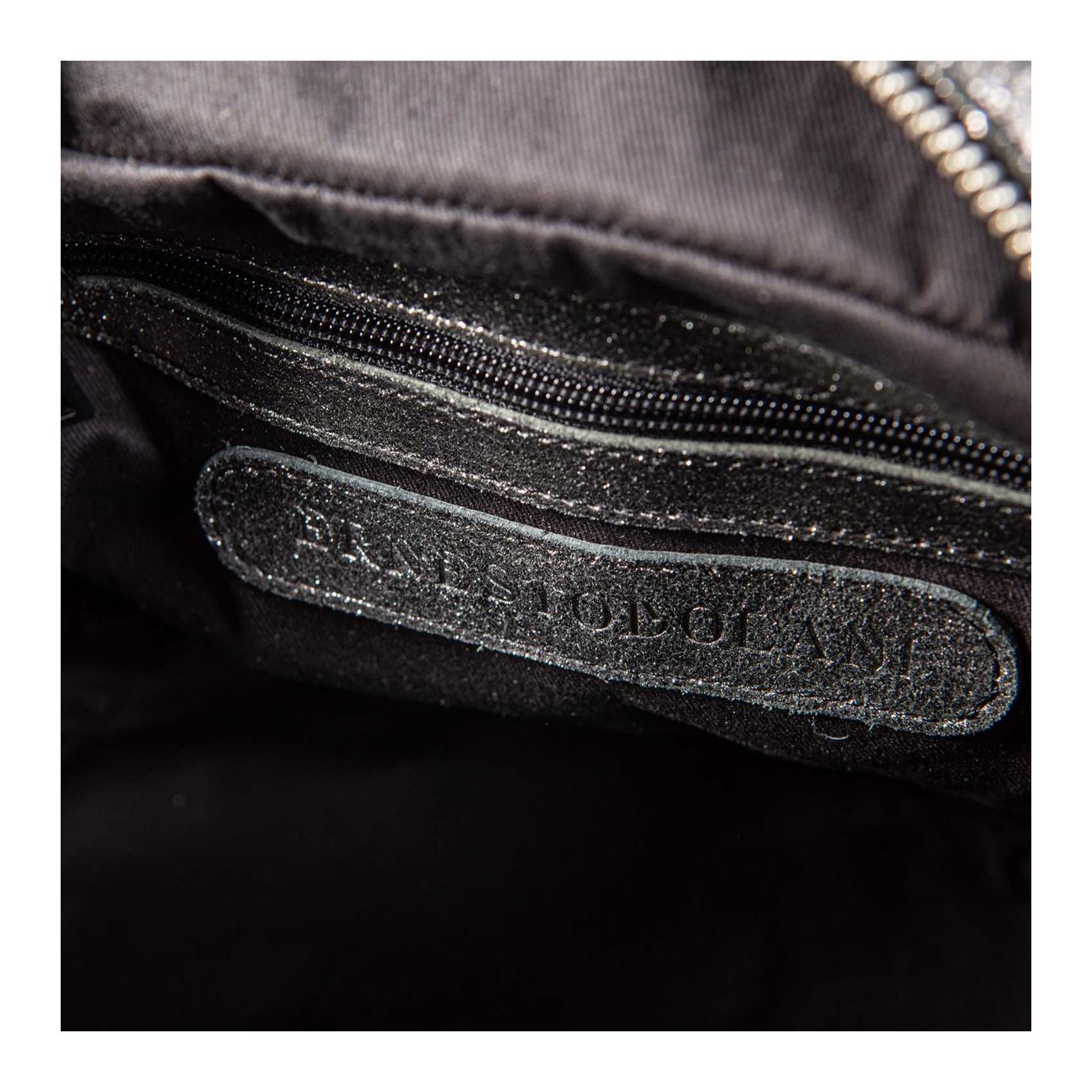 monospalla AMANDA in pelle laminata logo