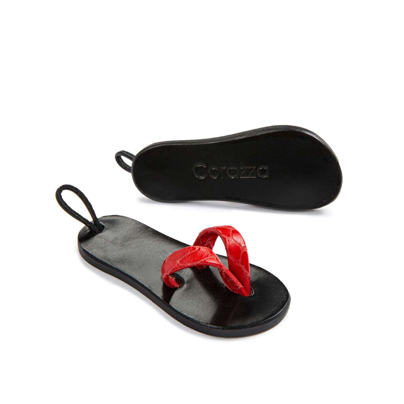 UMA x corazza portachiavi in pelle rosso e nero